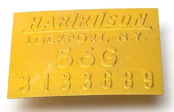 TAG-RADIATOR-BRASS-USA-56-57 (#E15631)
